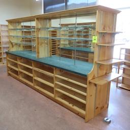 wooden shelving island, mirrored w/ glass shelves one side