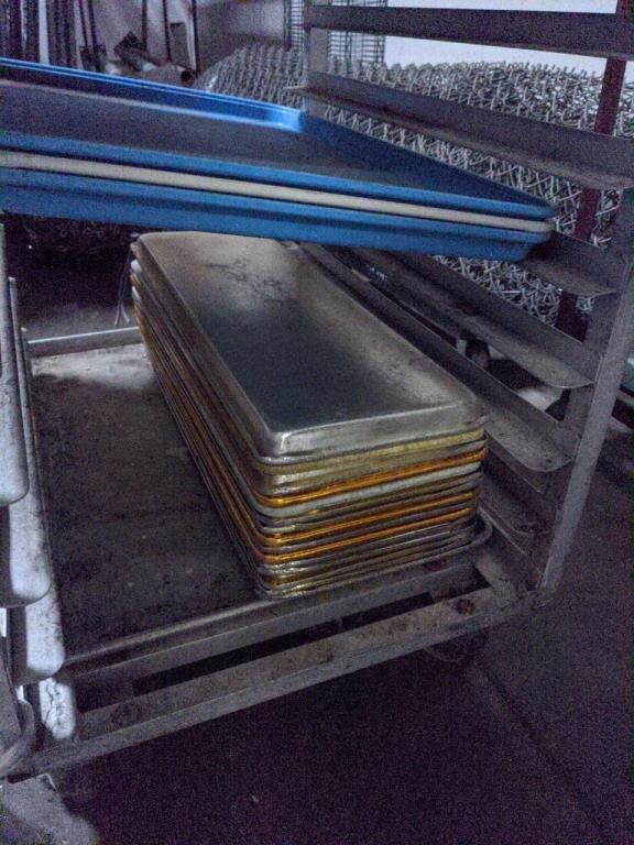 Cart with sheet pans and trays