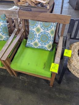 Wood chairs with cushions and throw pillows