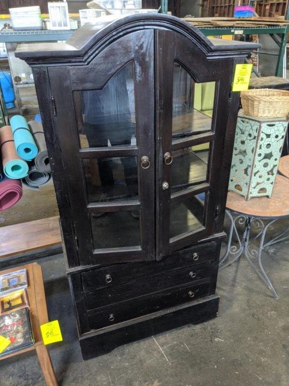 Wood china cabinet with glass doors