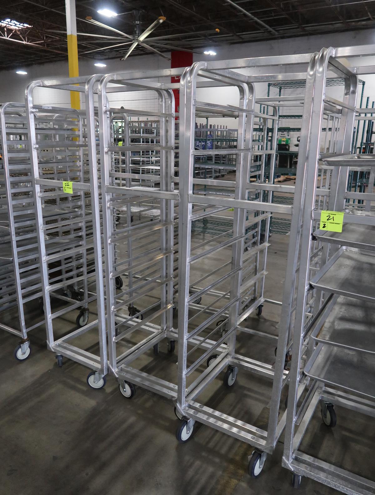 aluminum sheet pan racks, on casters, w/ some sheet pans