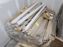 pallet of TRILUX LED light fixtures