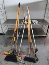 assorted brooms, shovel, squeegee, etc