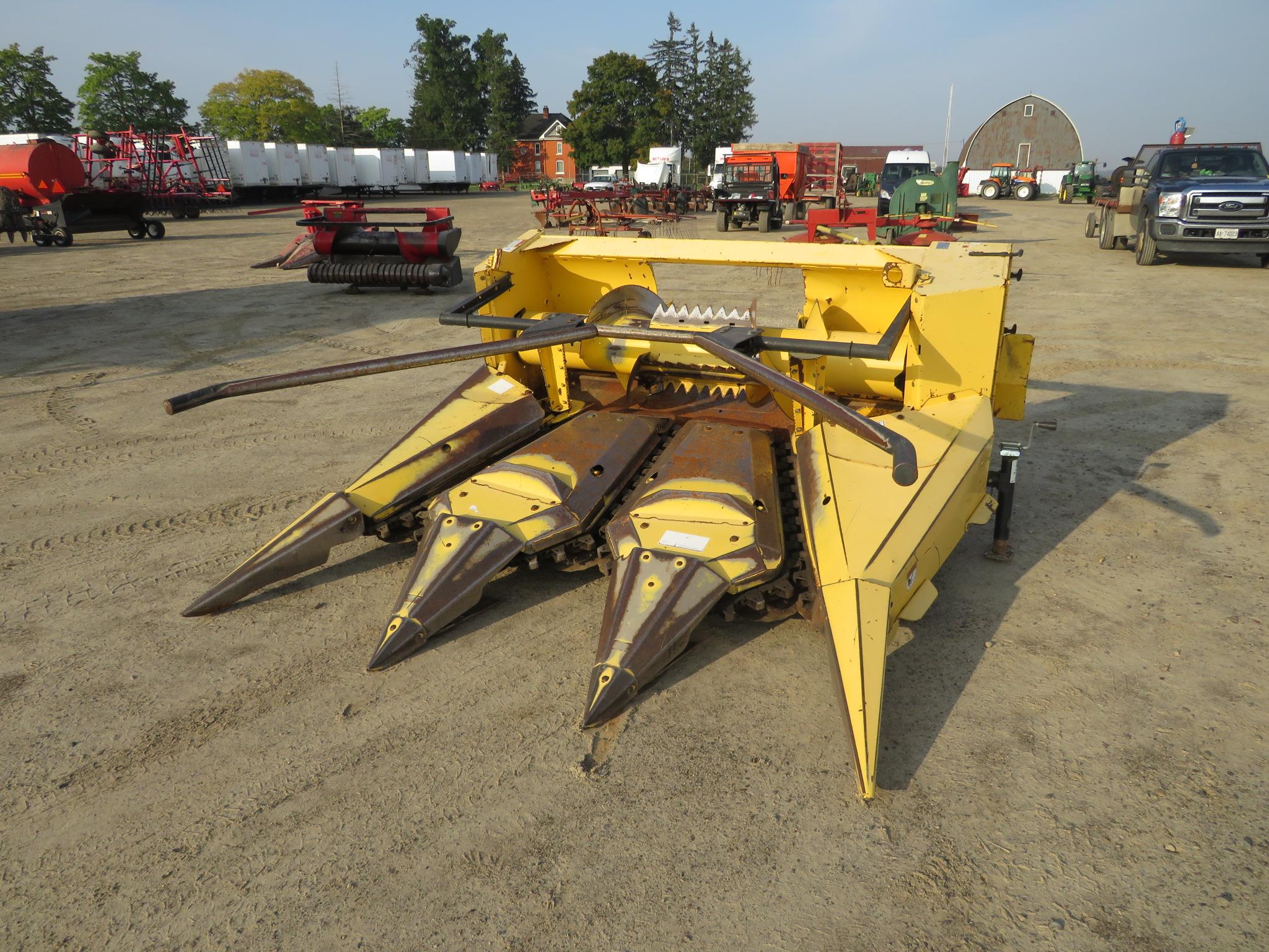 2001 NEW HOLLAND FP240 HARVESTOR W/ HAY HEAD AND CORN HEAD