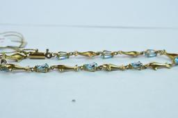 10 KT BRACELET AQUA MARINE DOLPHIN LINKS 4.5 GTW, $285.00 RETAIL VALUE