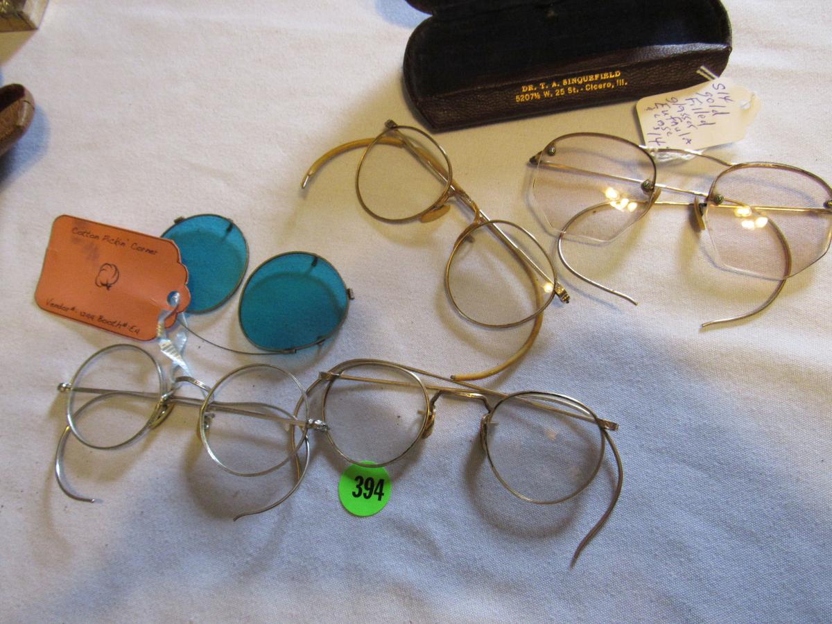 4 pair of vintage spectacles, 1 with clip on sunglasses