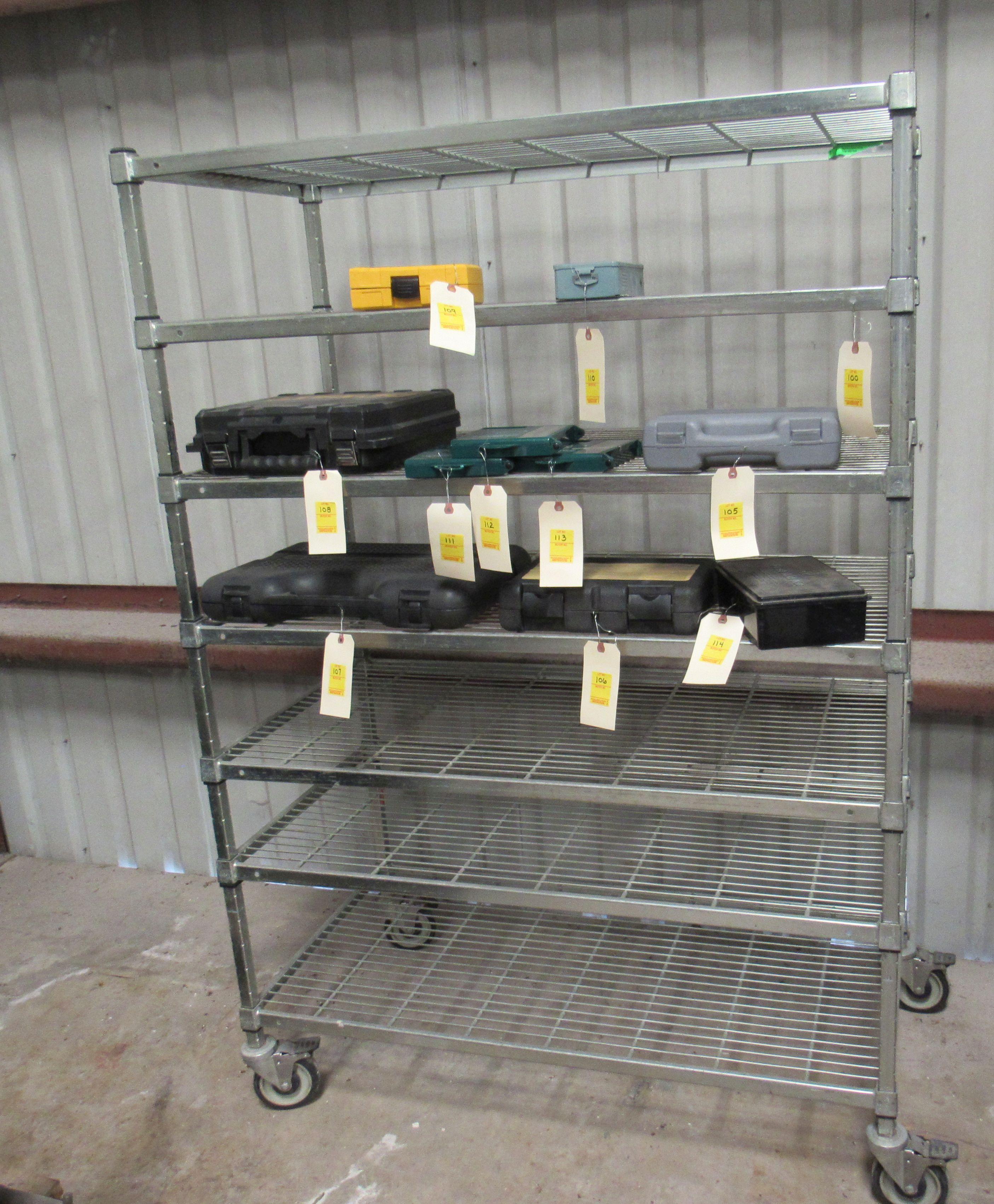 chrome shelf unit on casters  48"  Xv 24'  x 99.5' H