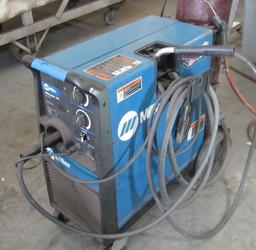 Millermatic 251 MIG welder with stnger and owner tank