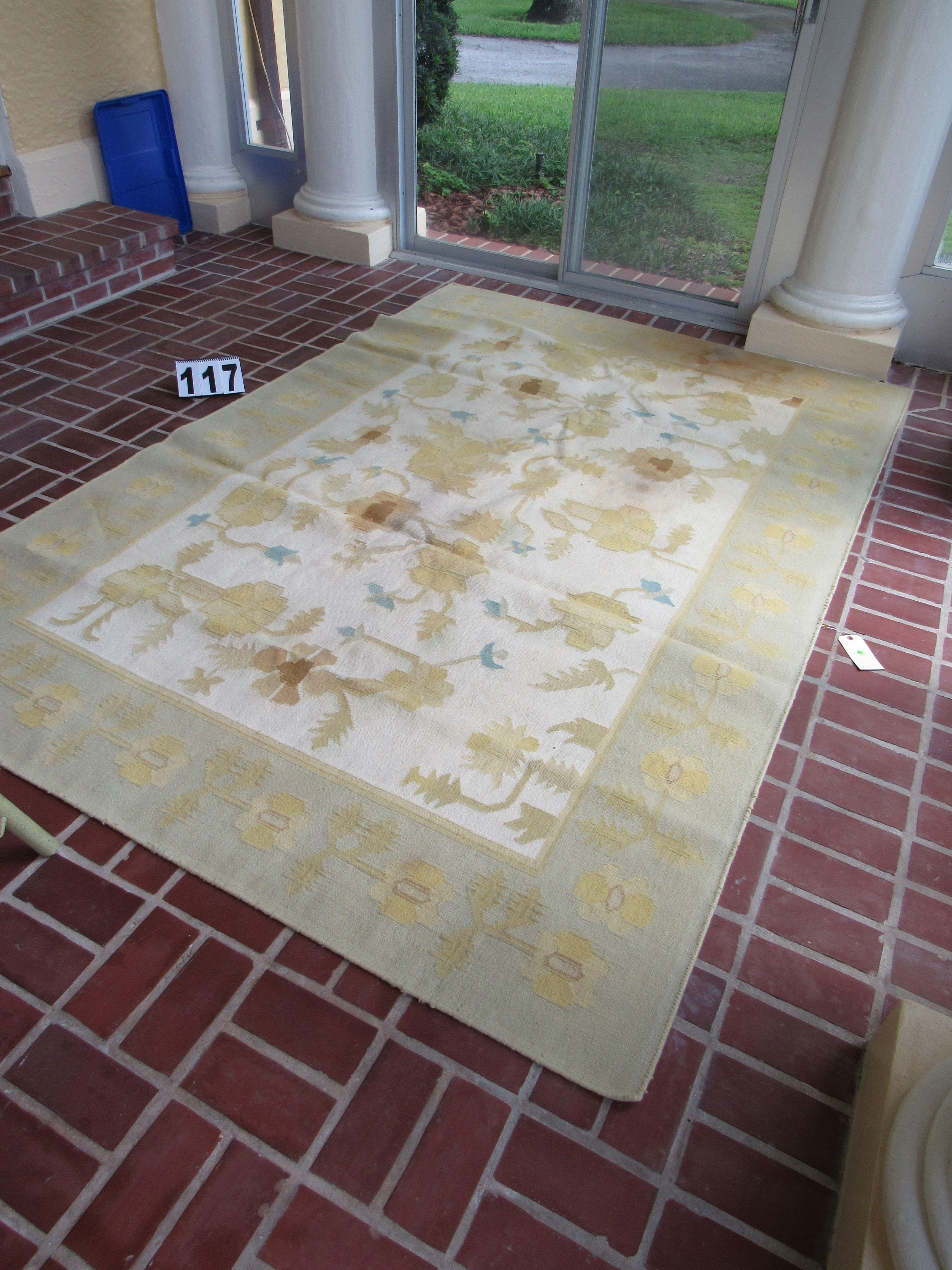 patio rug cream with gold and blue design 72" x 110" (some fade staining see photo)