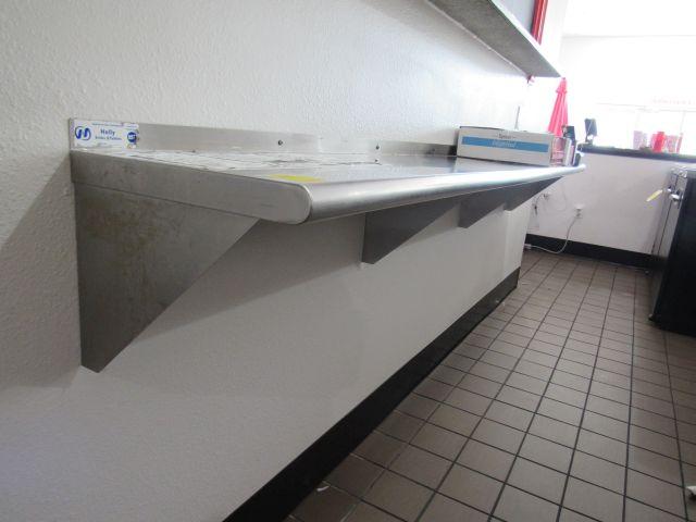 ss wall mounted shelf w/ brackets  96" L x 14" D