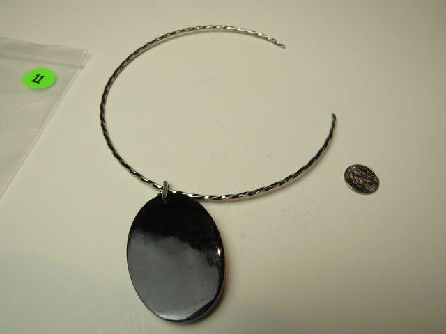 Abalone & onyx pendant on silver coated neck wire