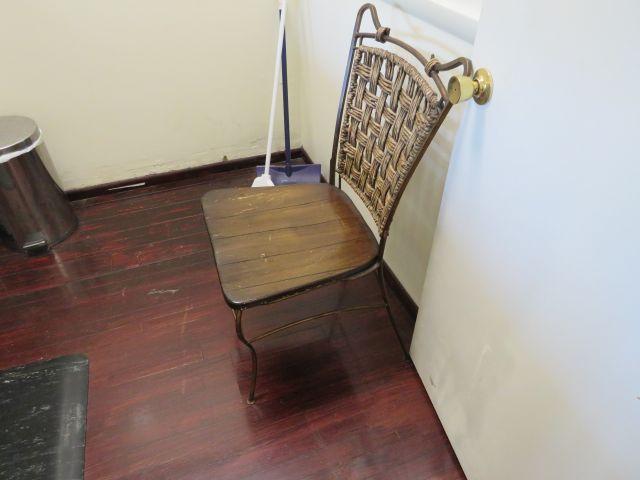 wrought iron framed chair with wood seat