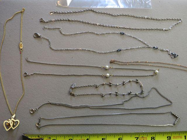 group of 8 neclaces mostly chain