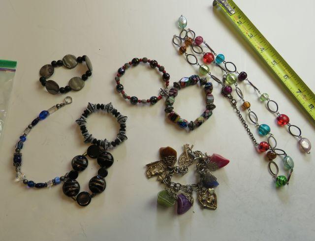 group of 8 mixed necklaces and bracelets