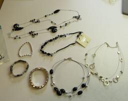 group of 7 mixed bracelets and necklaces