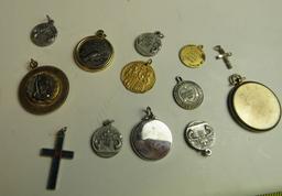 mixed pendants and charms including 4 Papal medals, pendant with swivel center cross and praying han