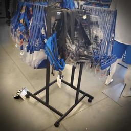 4 way clothing racks on casters with 18"adjustable height arms  merchandise not included