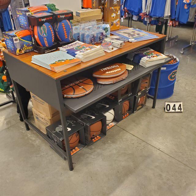 steel frame wood topped display table 50" wide x 30" deep x 33" high <br>merchandise not included