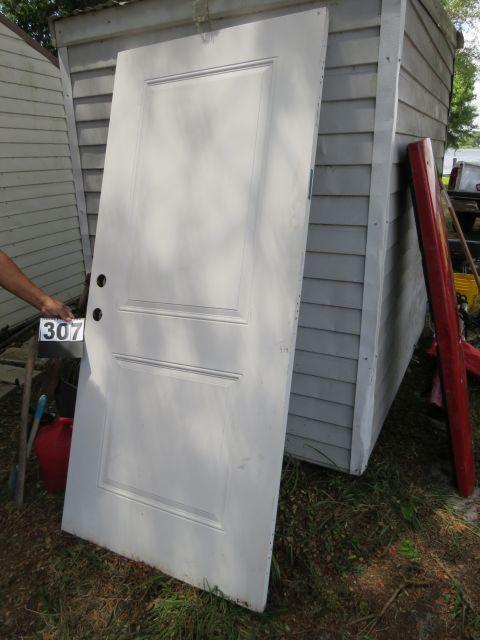 3'0" exterior metal jacketed door appears to be in good condition