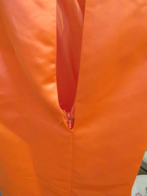 Xcite, size 8, tangerine colored strapless, prom or pageant dress!  Bust 36; Waist 27.5; Hips 39. Ne