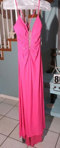 Xcite, size 6,  fuchsia-colored prom dress with spaghetti straps.