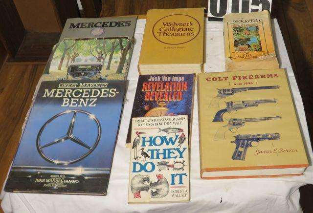 Books, including Mercedes Benz, Dictionary and Colt firearms