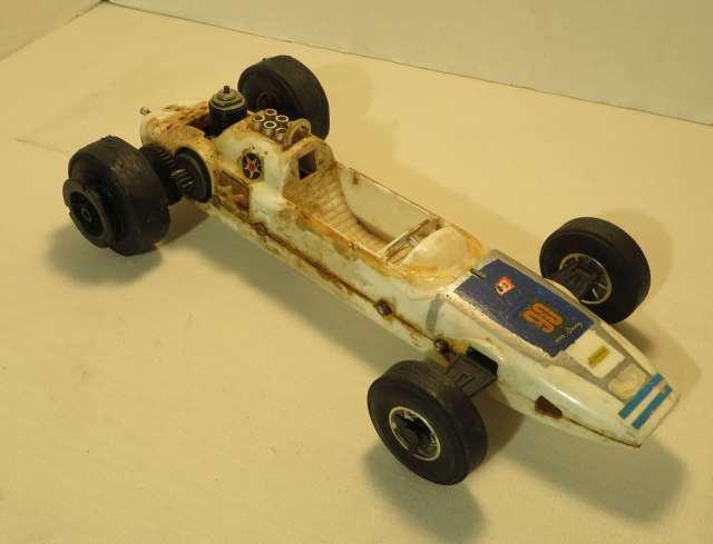Vintage Rear Engine Drive Gas Powered Race Car by Testors (engine appears to be seized) 12" overall