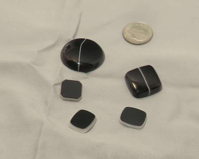 group of 5 assorted polished black and white Agates