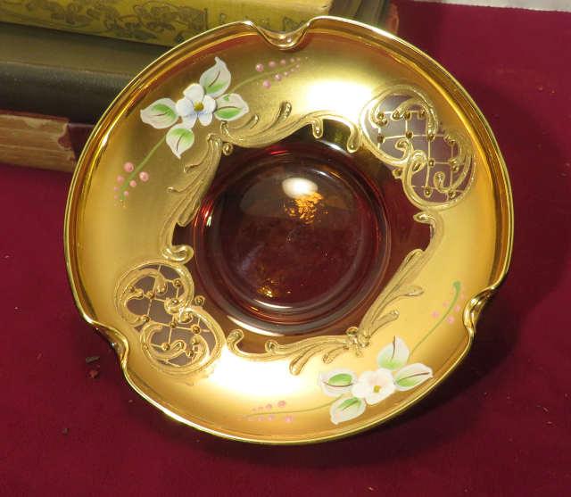 gold leaf ashtray with hand painted flowers plus small string of gold colored beads