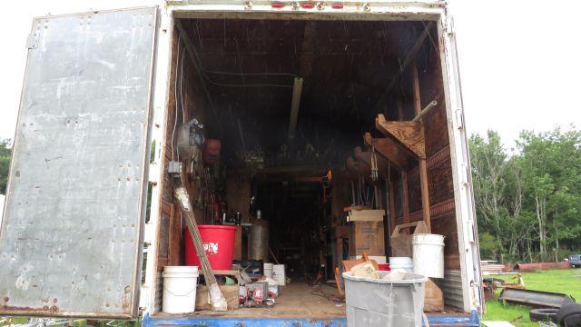 storage job site van trailer with shelving  floor is good doors are good.  Comes with built in shelv