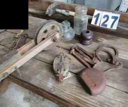 scale weight, wood pulley block, horseshoes  railroad spikes,  insulators and ball jar