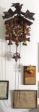 ornate wood cuckoo clock 20” high x 15” wide