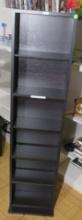 wood CD cabinet 55” high 13” wide 10” deep with 6 adjustable shelves