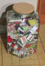 match book collection in 3 gallon glass jar