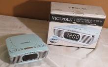 Victrola - Reveil Bluetooth clock radio and CD player  This is new product that may or may not have