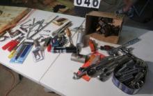 Assorted end wrenches, ratchets, wrenches, teeth for rigid pipe threaded, detail paint sprayer