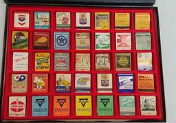 35 Advertising matchbooks in display case