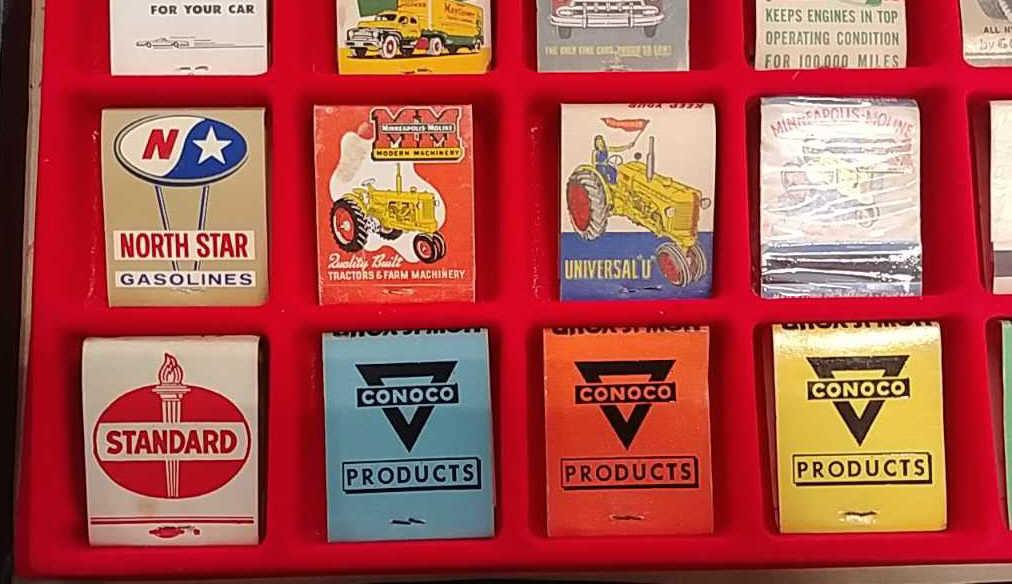 35 Advertising matchbooks in display case