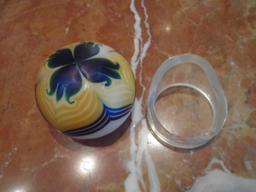 Orient & Flume Paperweight, blue and yellow flower design.