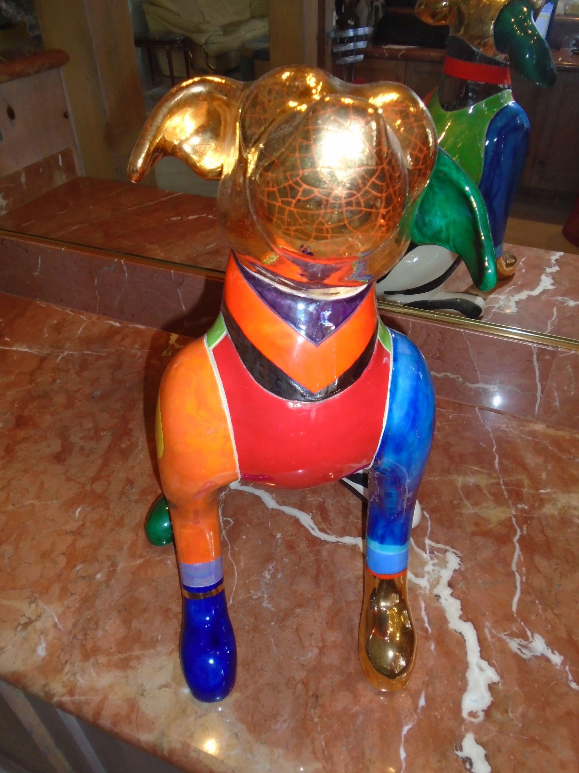 "Pork Chop" Multi colored dog statue. Hand signed by the artist