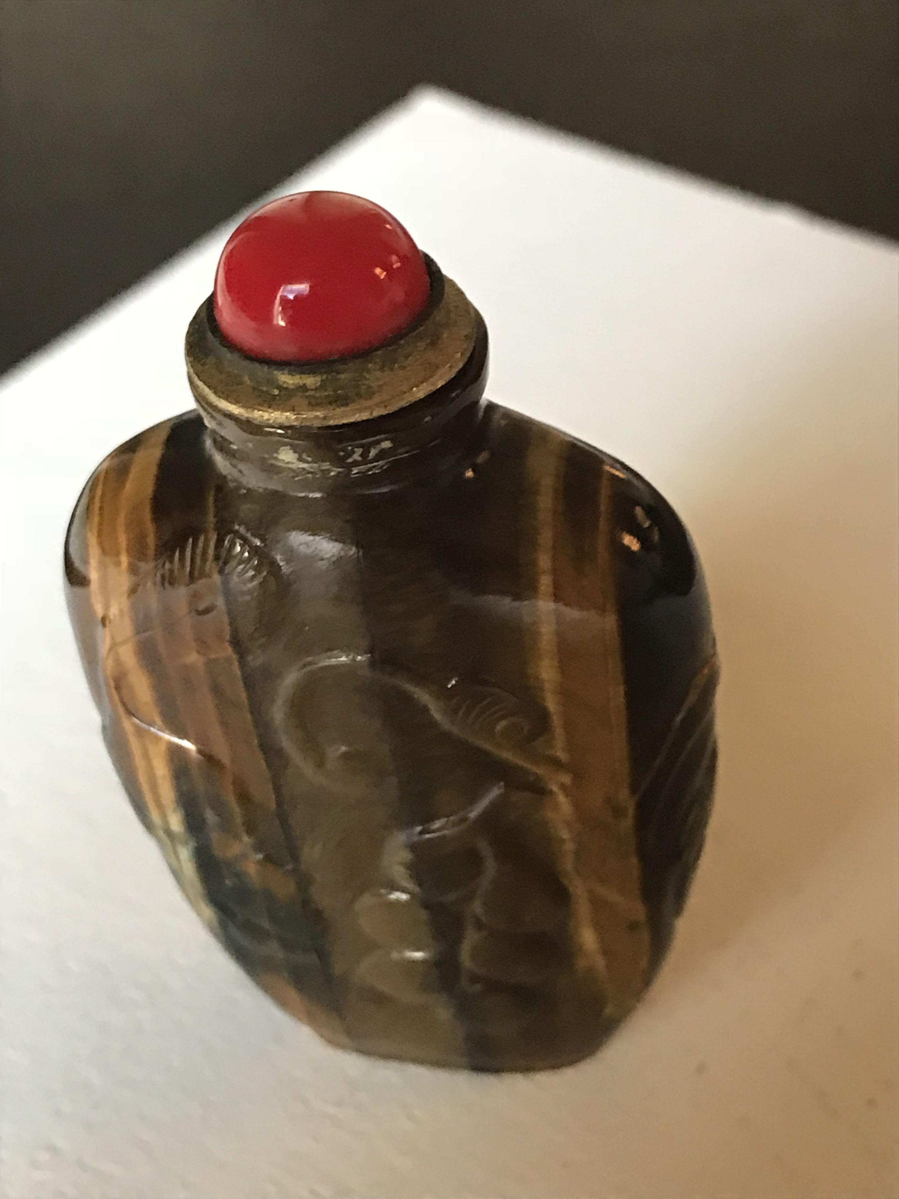 Genuine Tiger Eye gemstone sniffing bottle, hand carved with vine leaflets and grapes on the surface