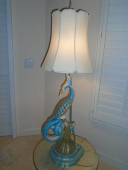 Table lamp with light blue and white glass bird.