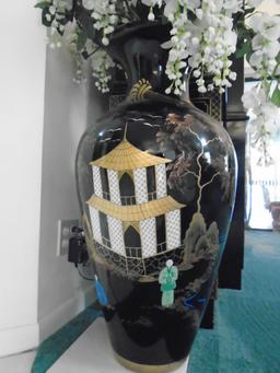 Large black painted vase with Chinese motif.