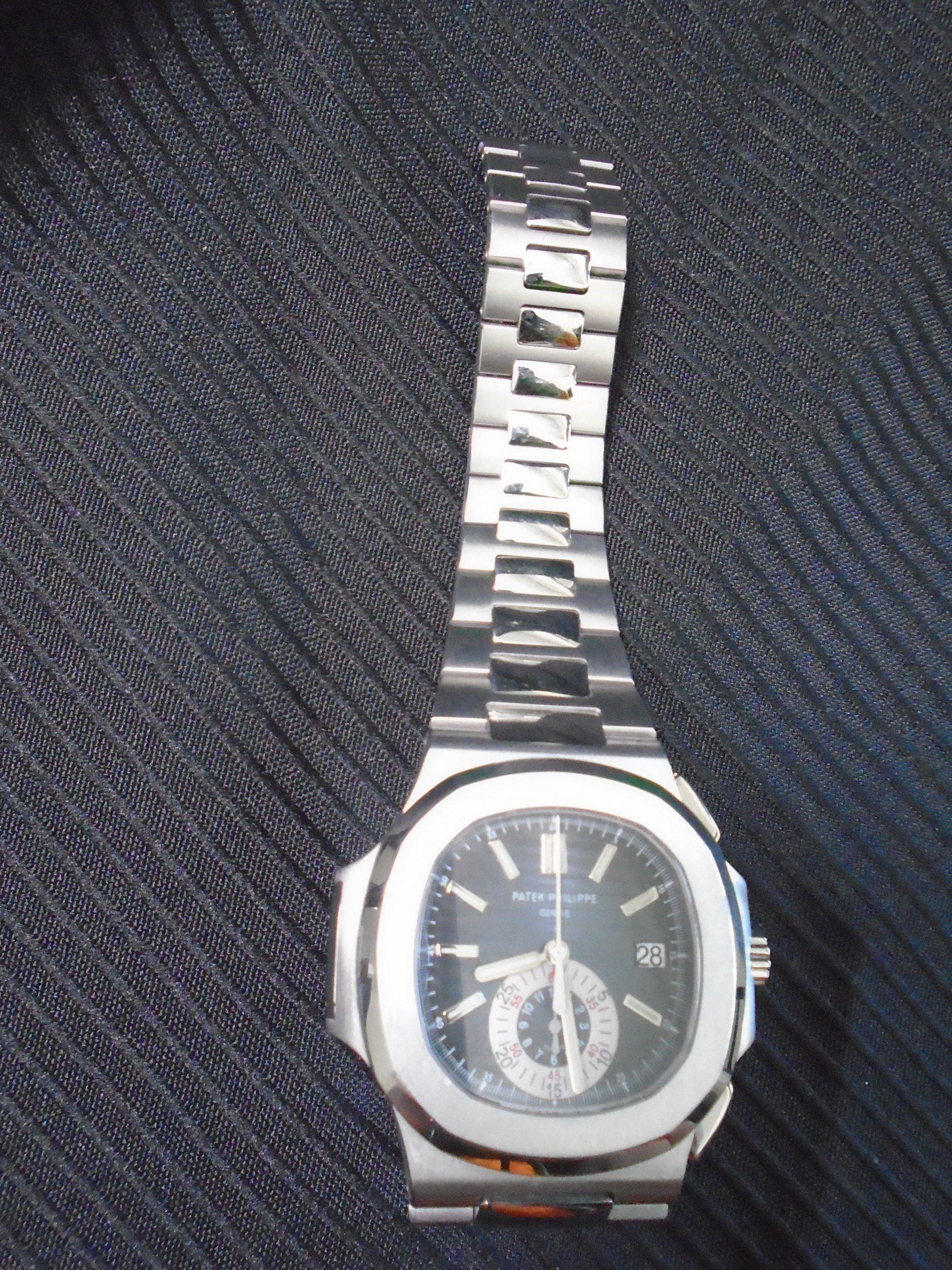 Mens Watch, Patek Philippe Geneve, Nautilus, stainless steel.