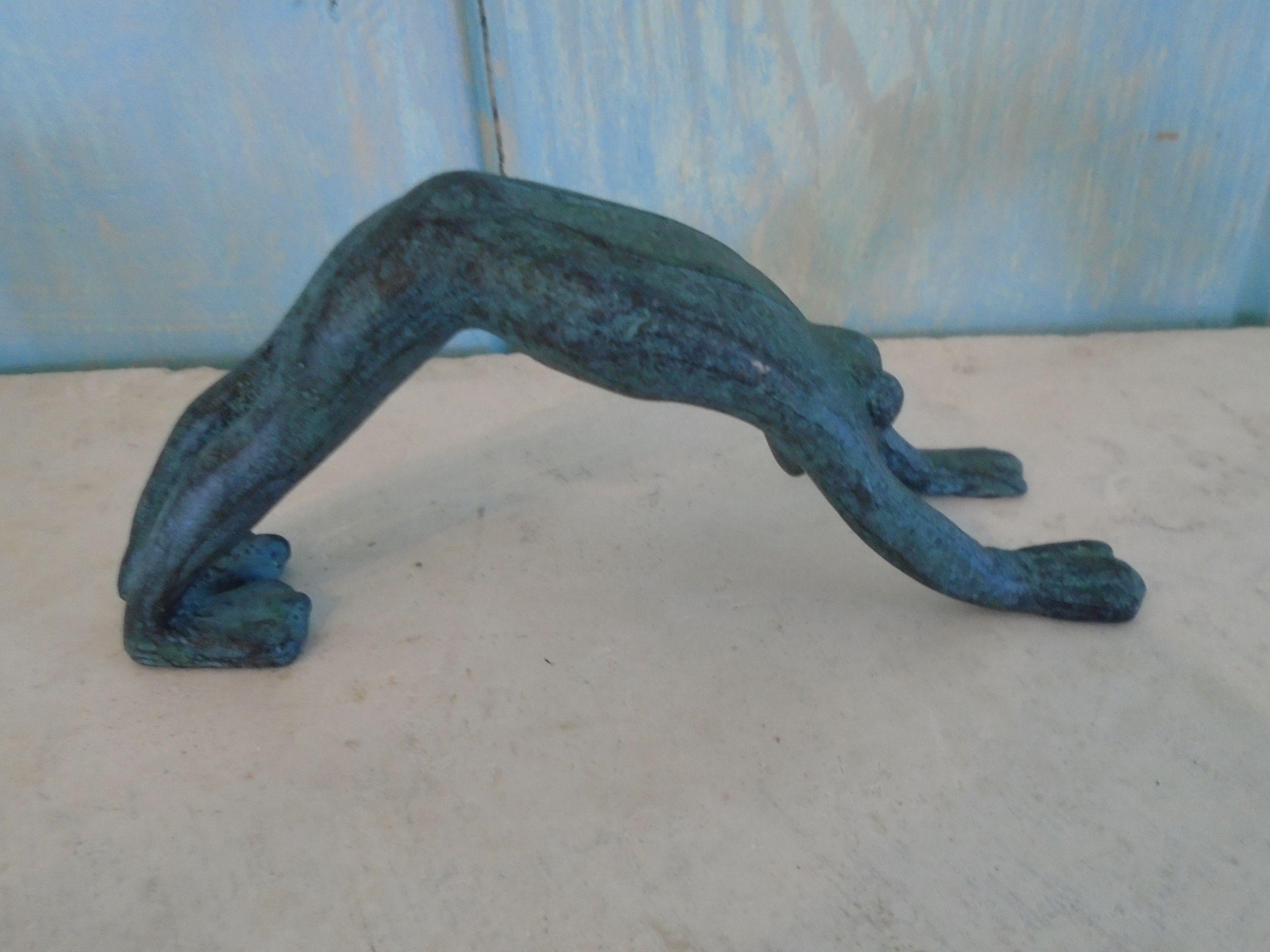 Set of 8 Metal Yoga Frogs.