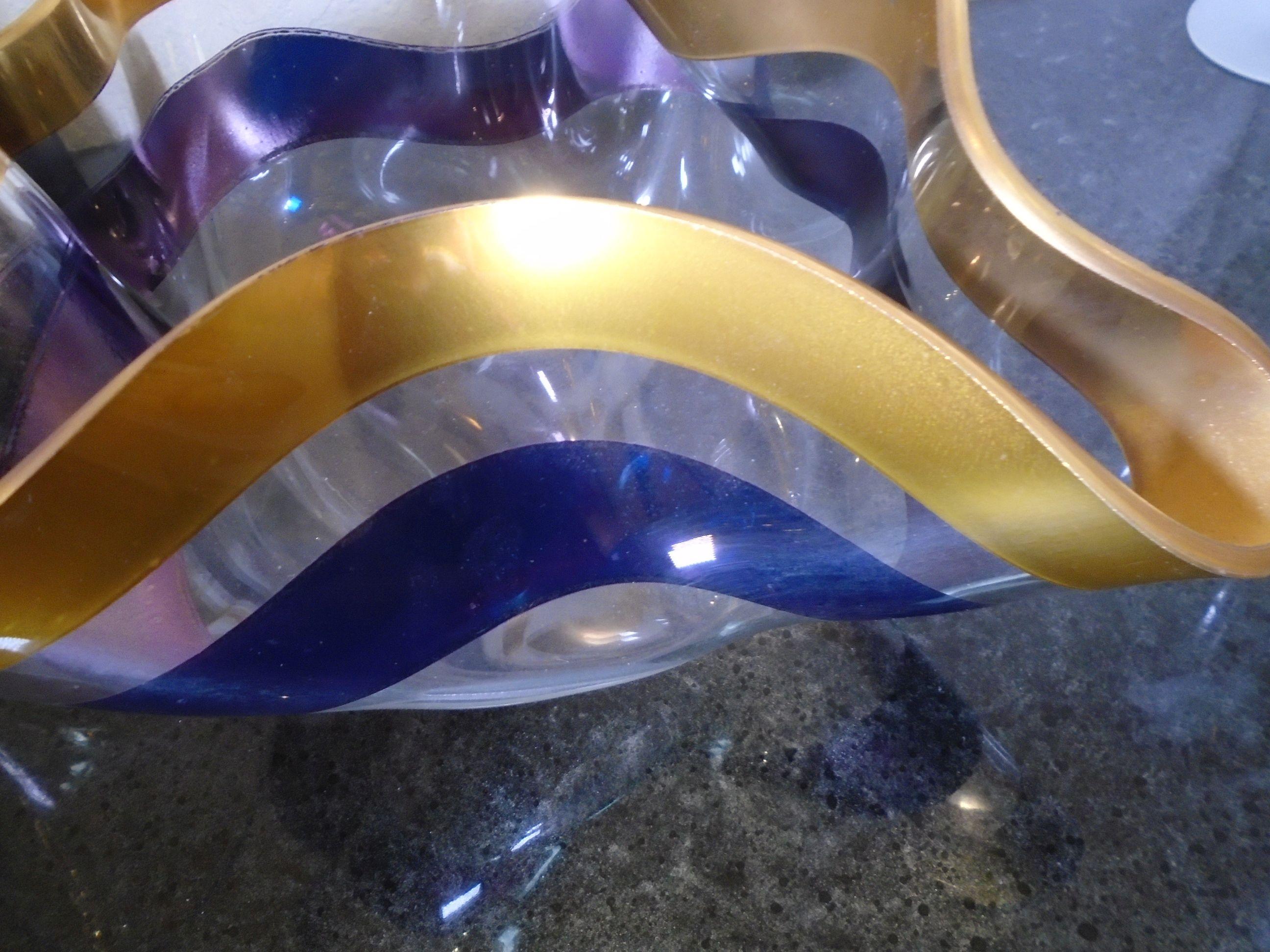 Fox Fire glass bowl with gold & purple stripe.