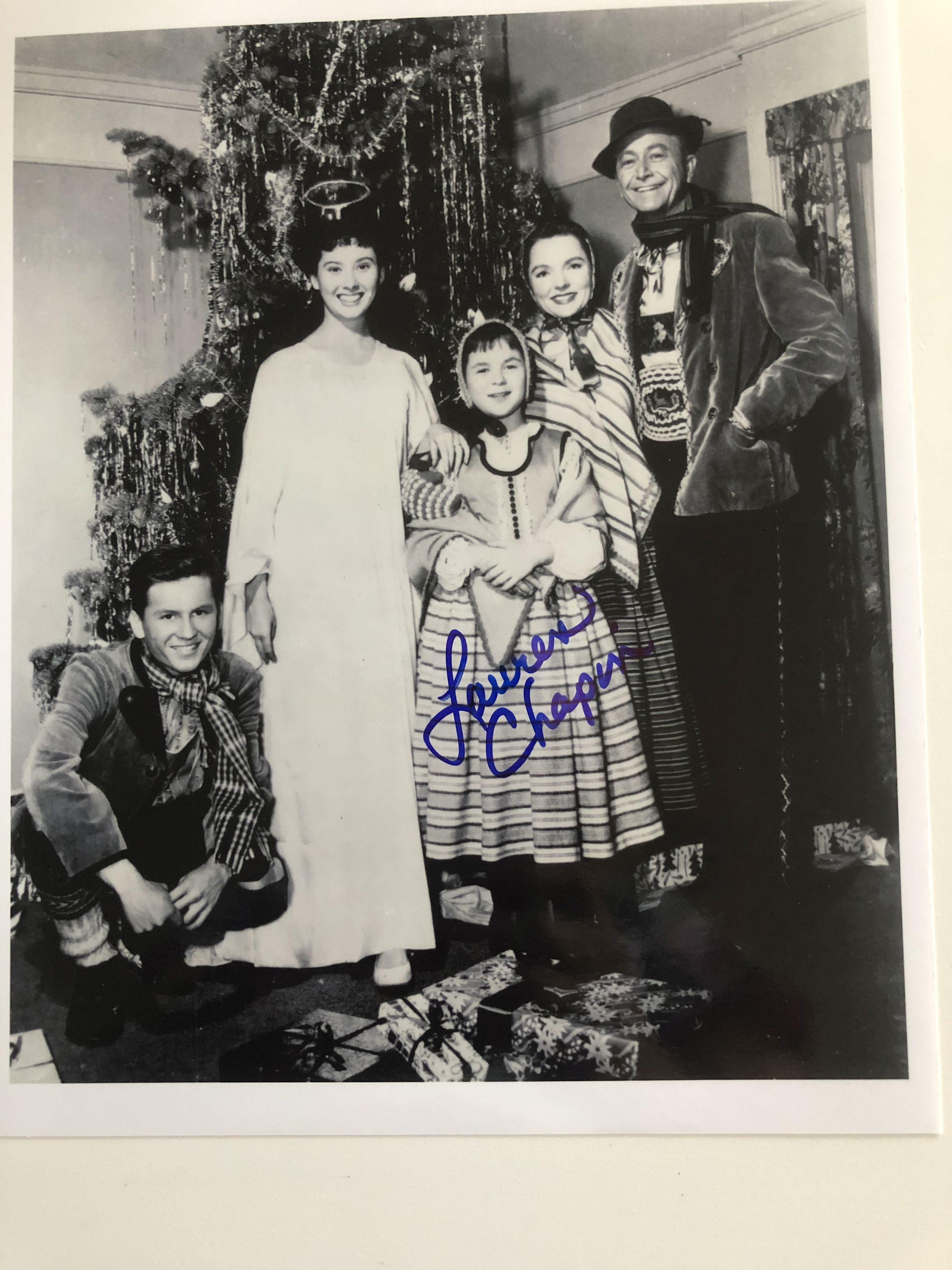 Photos of the cast from Father Knows Best autographed by Lauren Chapin.