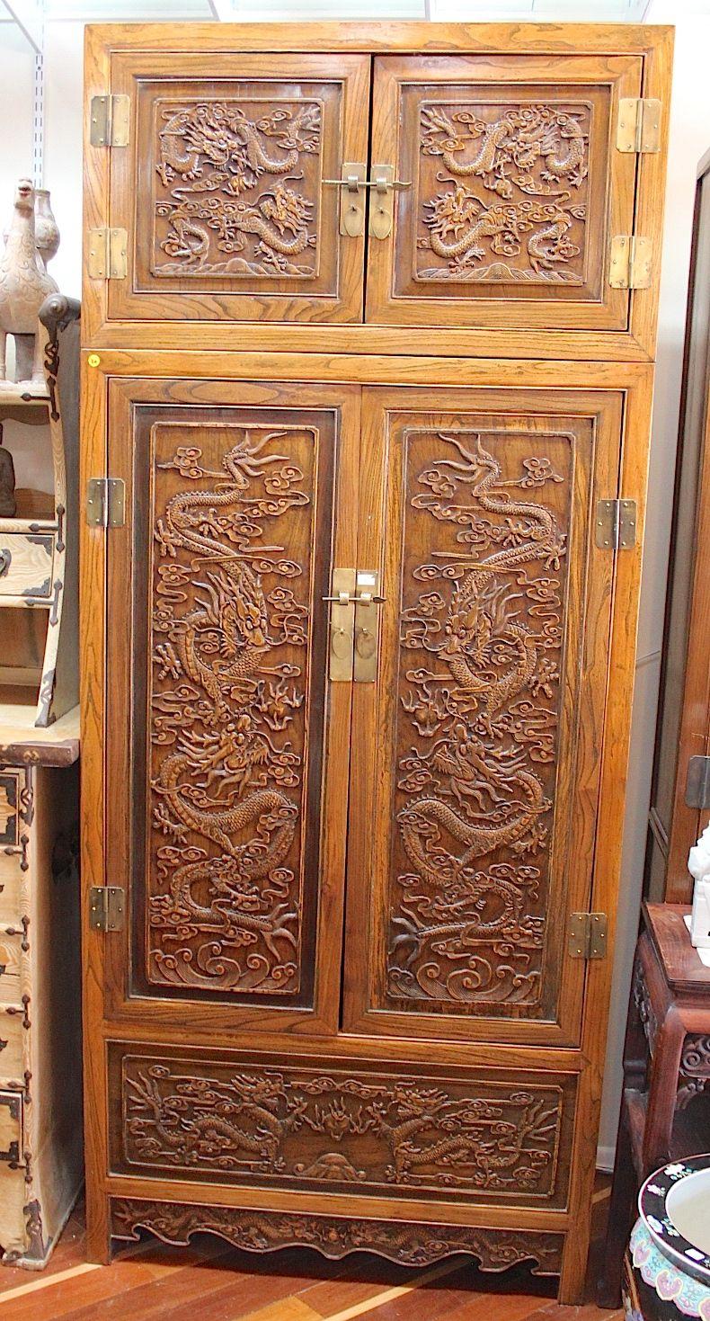 Wooden cabinet with carved dragons motiffs