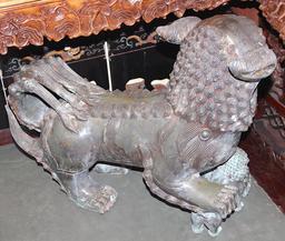 Cast iron foo dog with baby