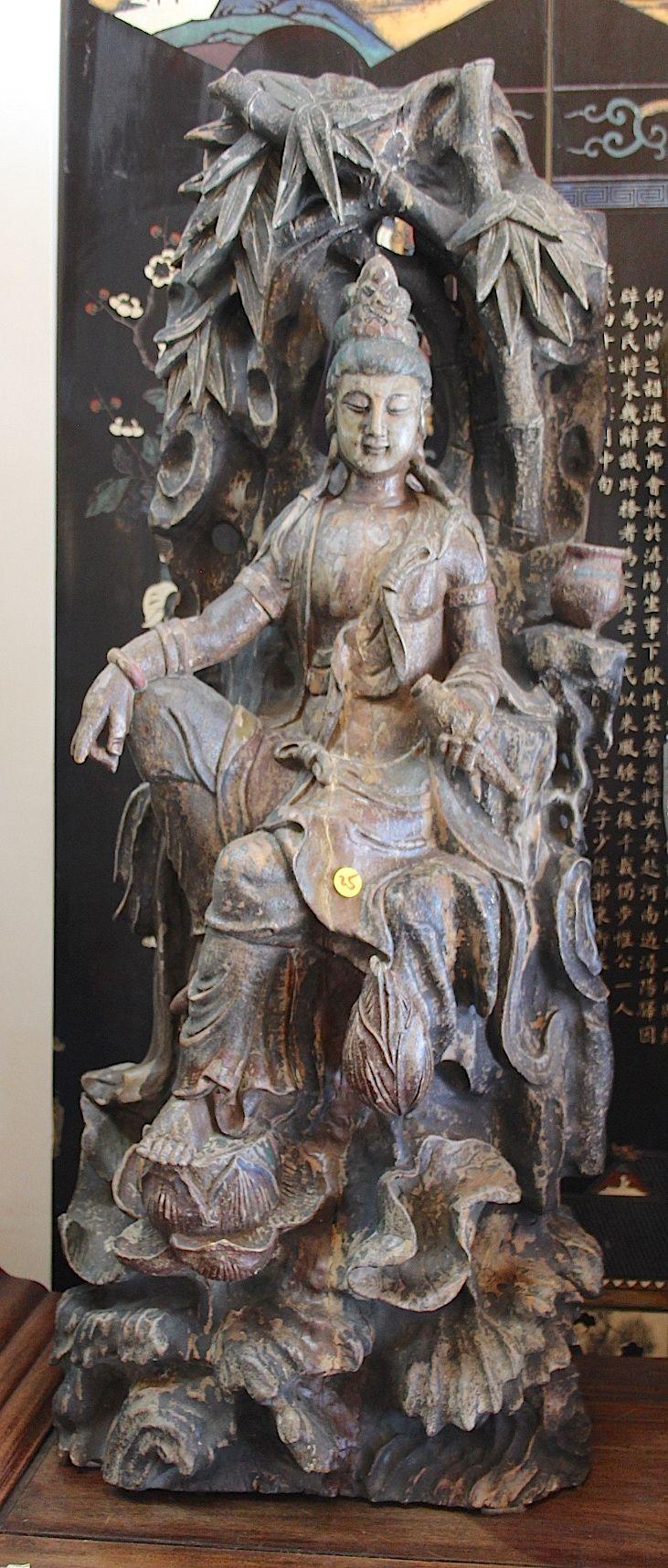 Antique wooden carved Kwan yin ( Goddess of compassion)